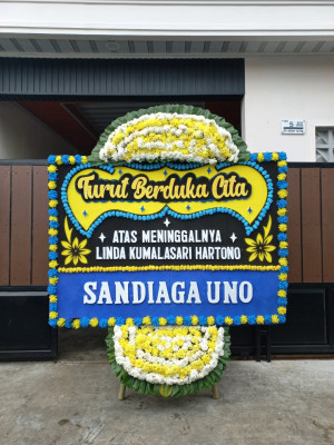 Papan Bunga Duka di Maje